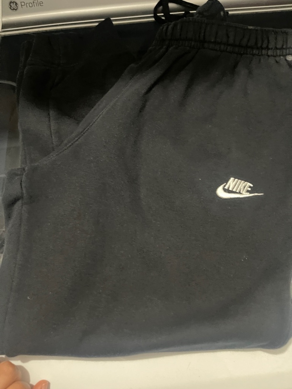 Nike Kids Black Sweatpants with White Swoosh